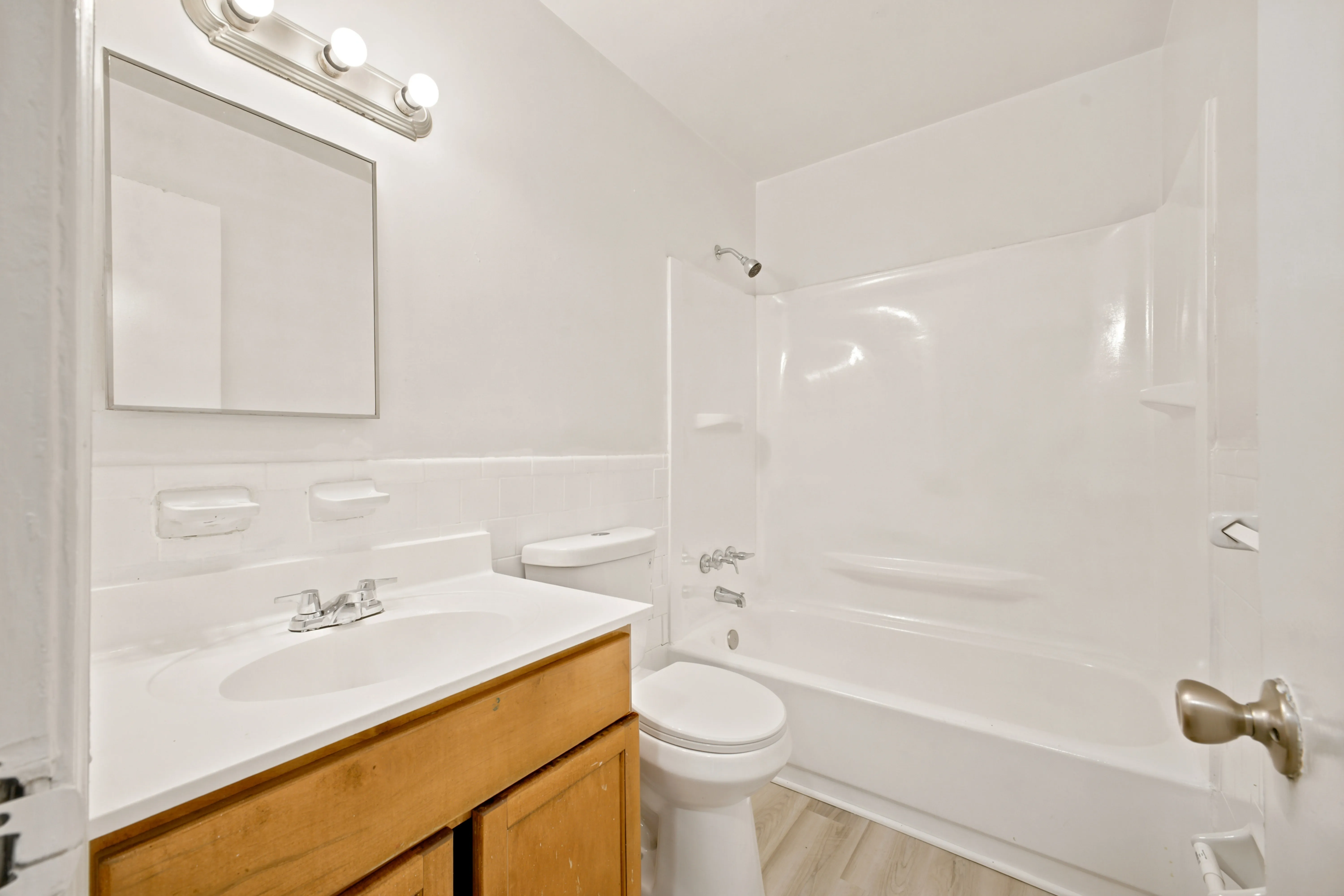 Bathroom with vanity, tub and shower
