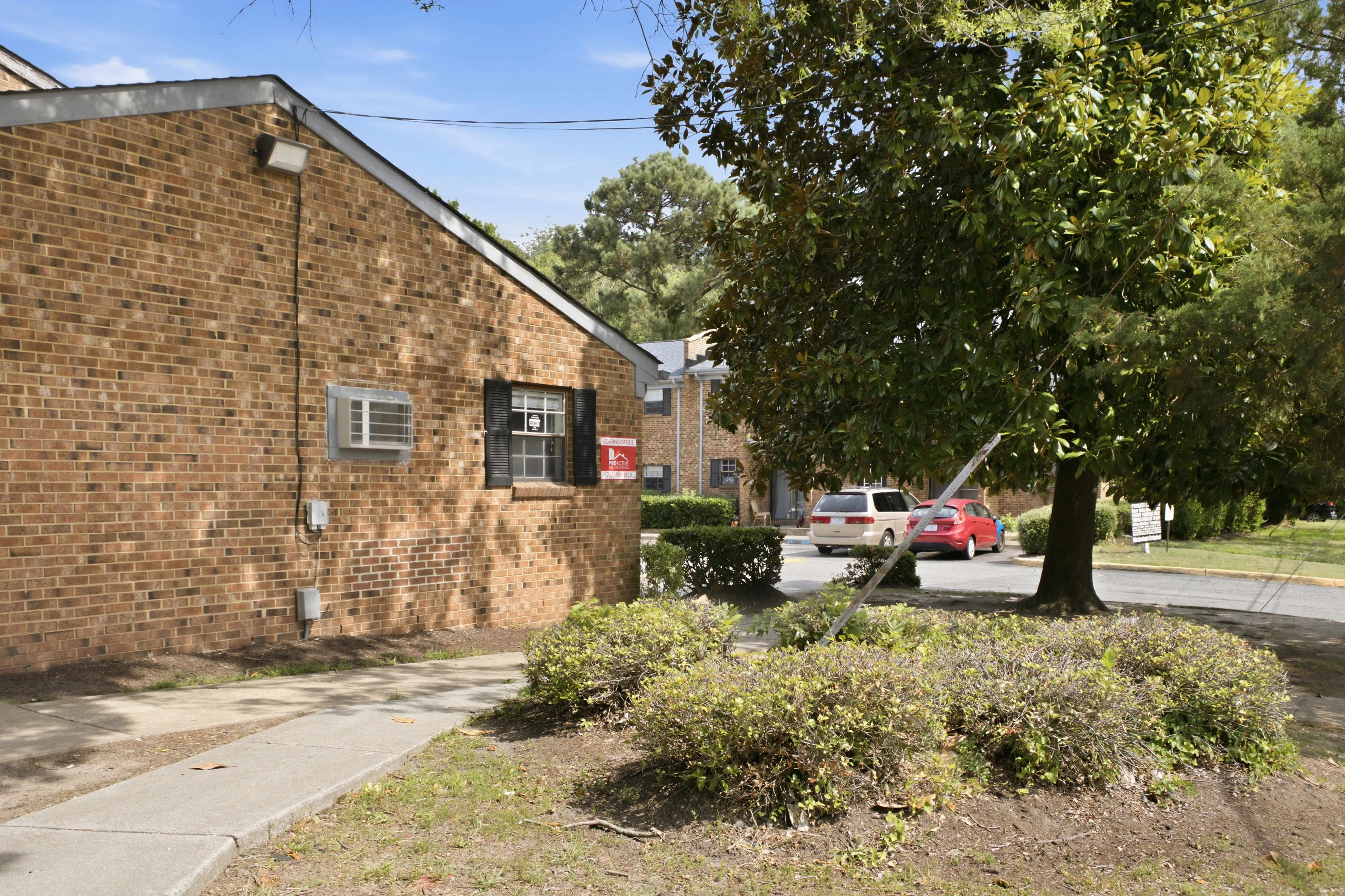 Brick building and landscaping at River Oaks